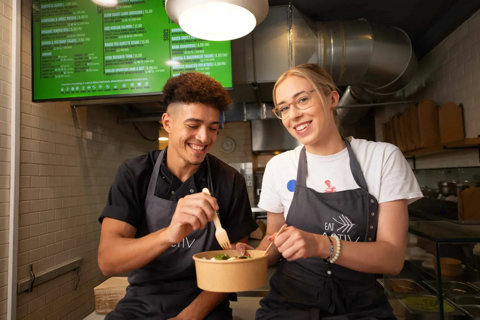 Staff eating together at the kitchen